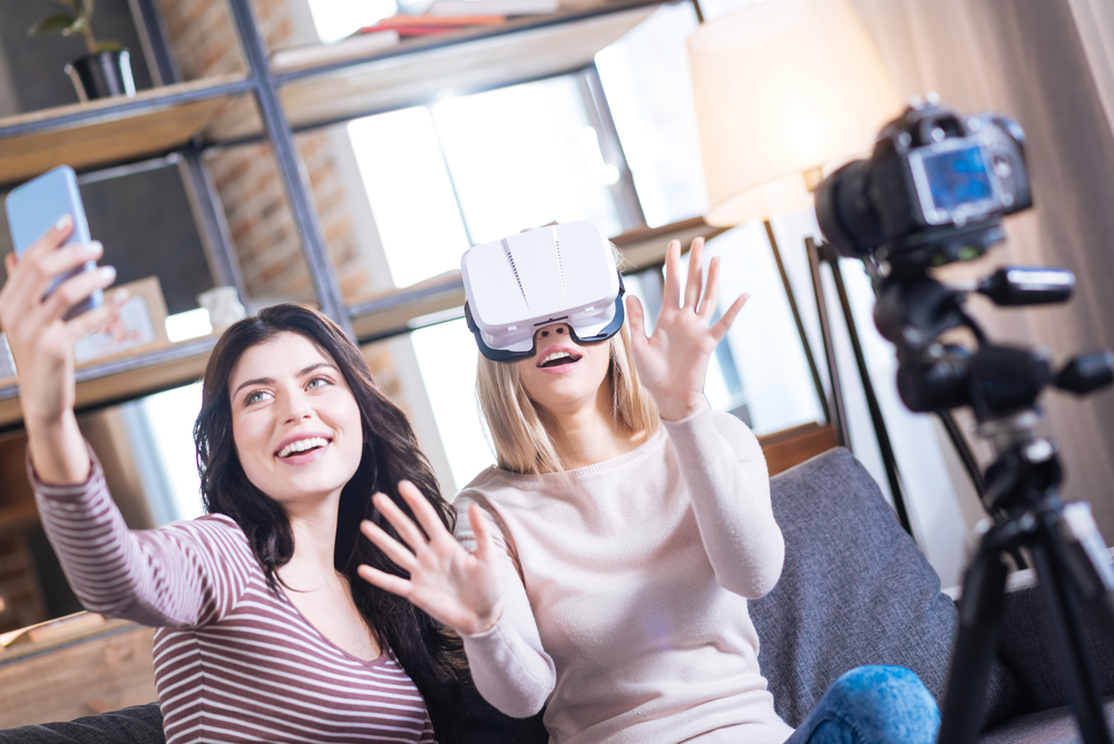 Delighted young woman wearing 3d glasses